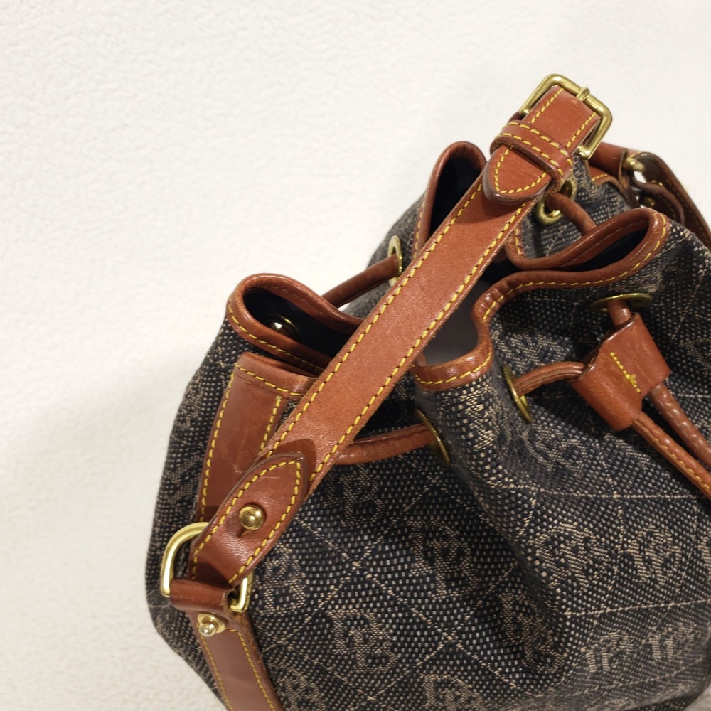 Dooney and Bourke Bucket Bag Medium Black Tan Monogram Vintage Crossbody USA - Picture 2 of 14
